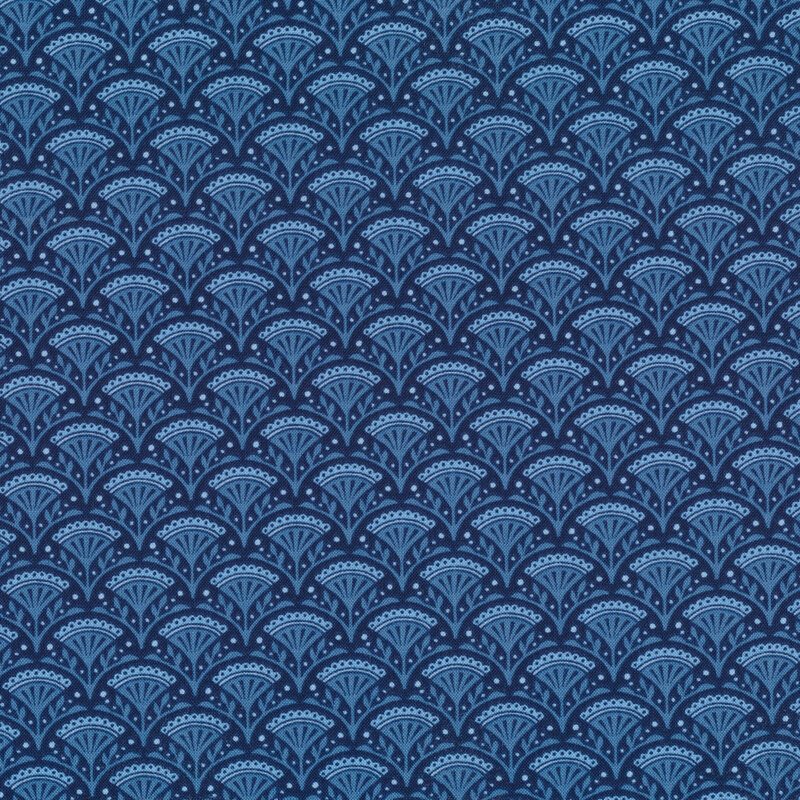 Tonal dark blue fabric with light ornamental scallops all over