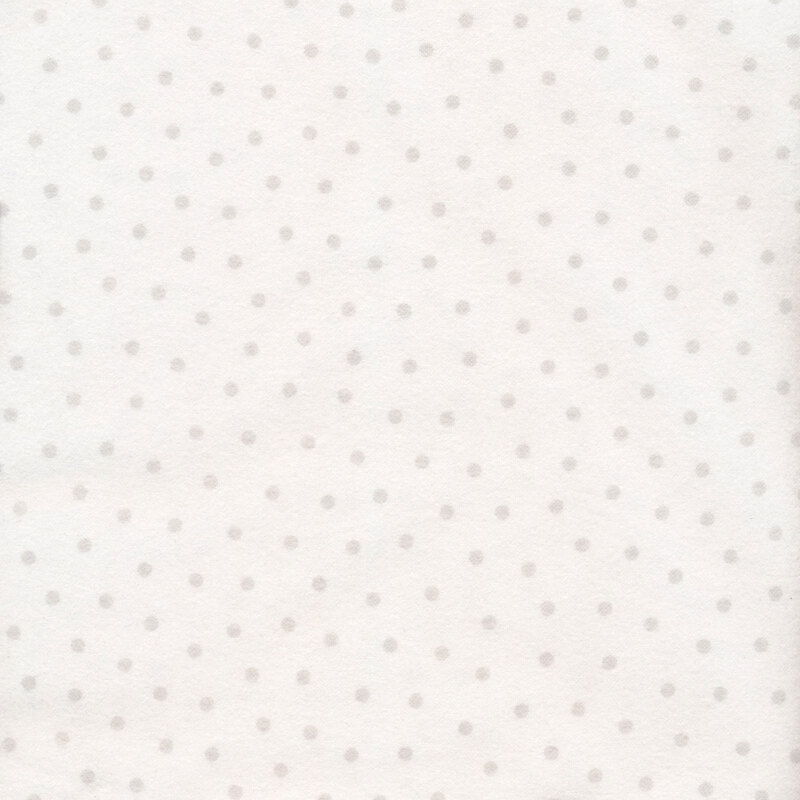 white flannel fabric with pale grey polka dots all over