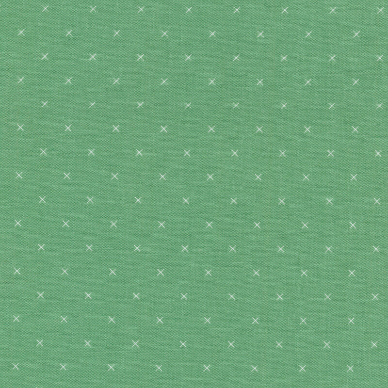 Small cream x's on an aqua background