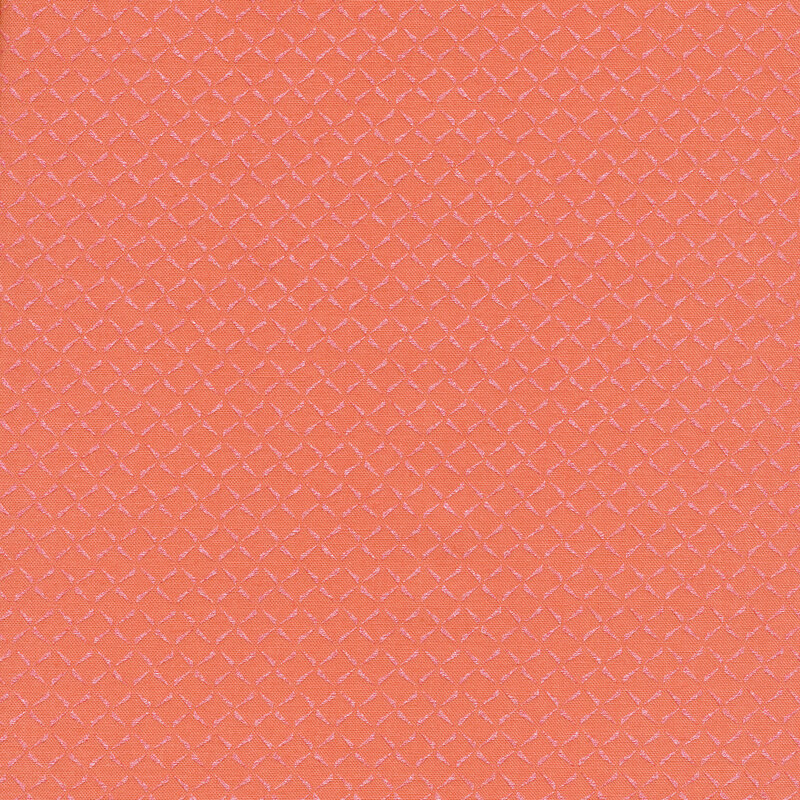 Peach fabric with an iridescent lattice pattern