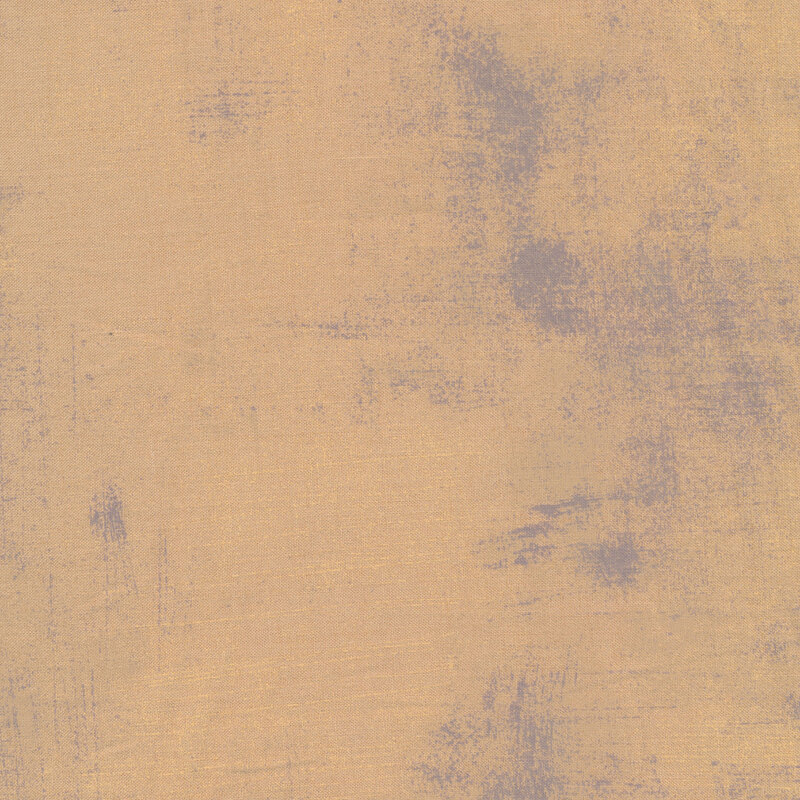 Taupe fabric with bits of light brown and grey grunge texturing