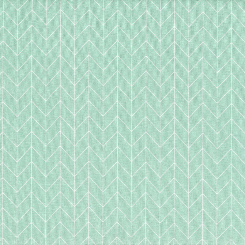 Light aqua fabric with white chevron pattern designs