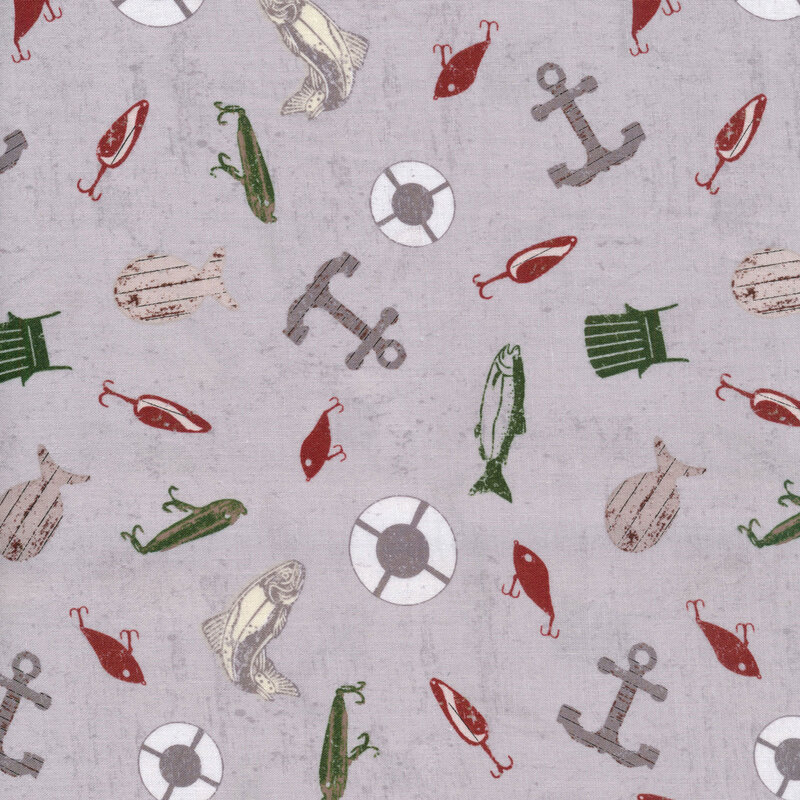 fabric with fishing gear, anchors, and chairs tossed on a textured gray background