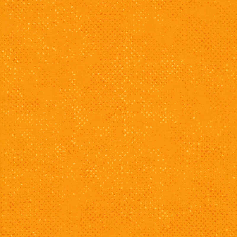 Textured orange fabric with a pattern of small tonal speckles