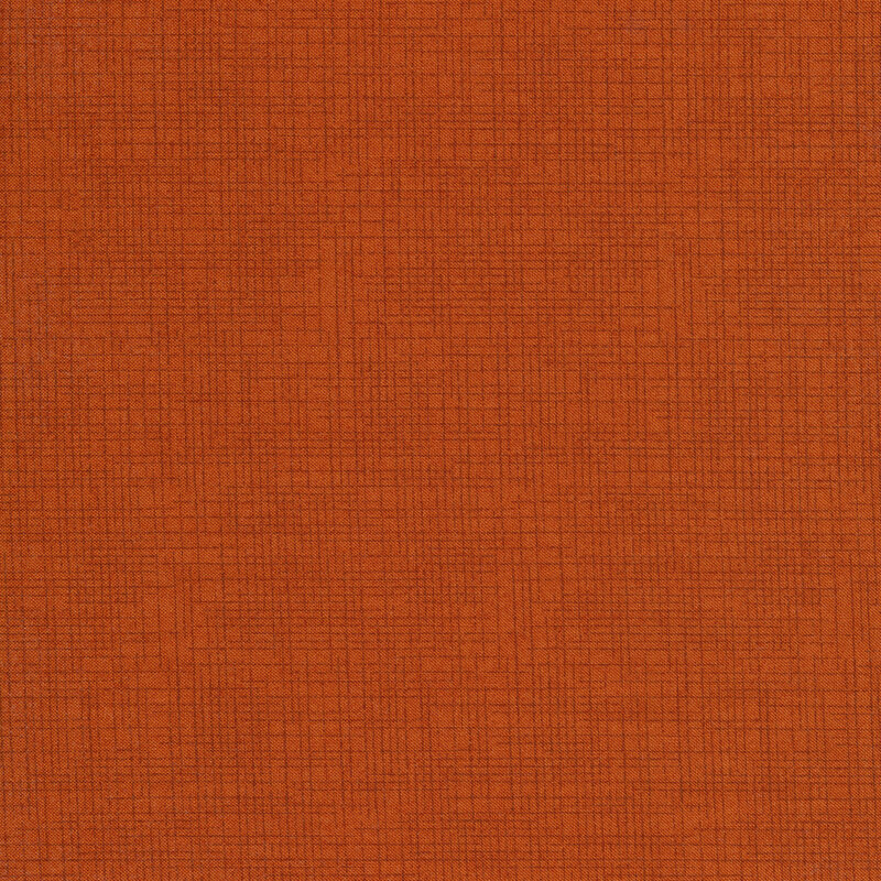 Burnt orange colored linen textured fabric