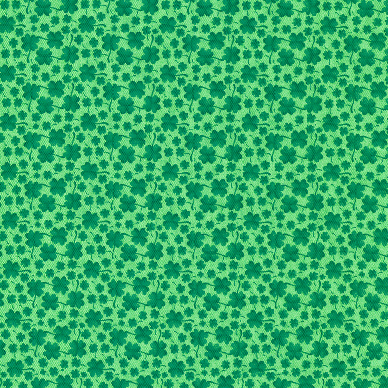 Kelly green fabric with dark green shamrocks all over