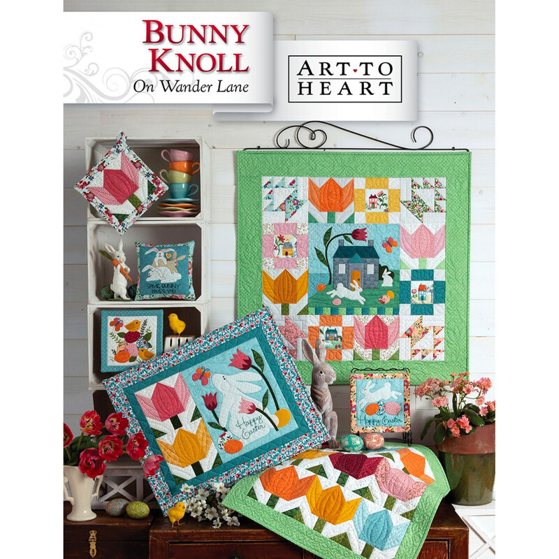 front of Bunny Knoll block pattern book, showing finished block and additional finished projects