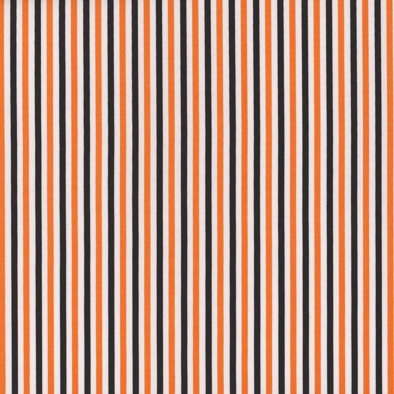 White fabric with orange and black alternating stripes