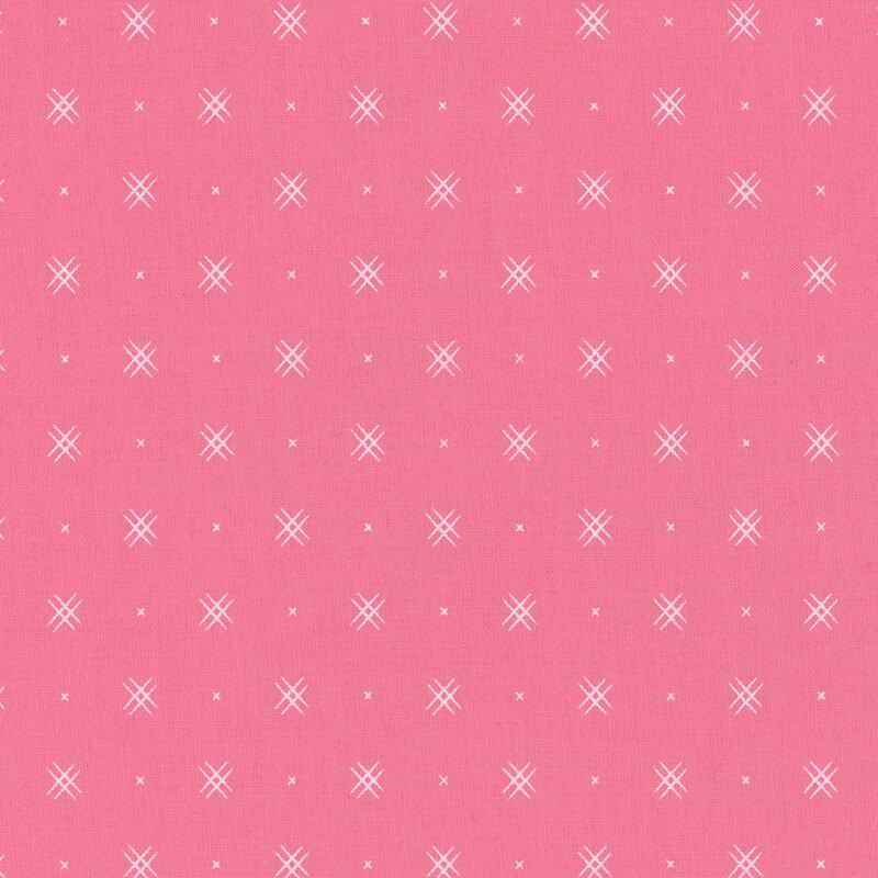 Pink fabric with rows of small white x's and double criss-cross patterns