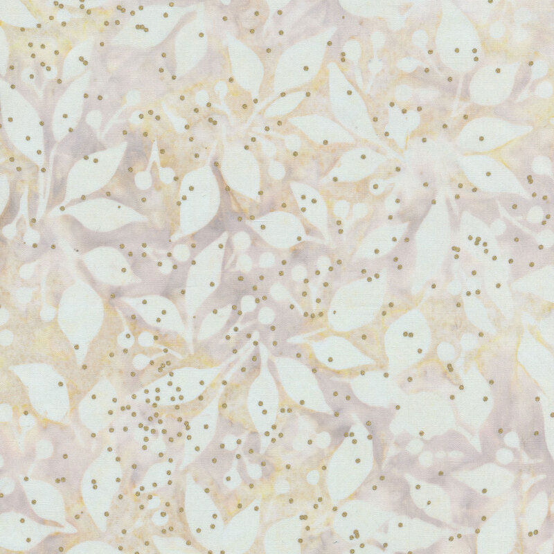 Batik fabric with white leaves and berries and gold metallic dots all over a cream mottled background