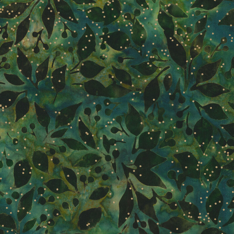 Green batik fabric with dark green leaves and berries and small gold metallic dots all over