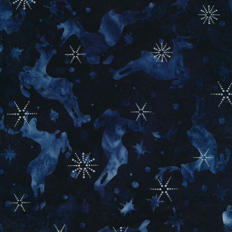 Deep navy blue fabric with light blue jumping caribou and snowflakes and silver metallic accents