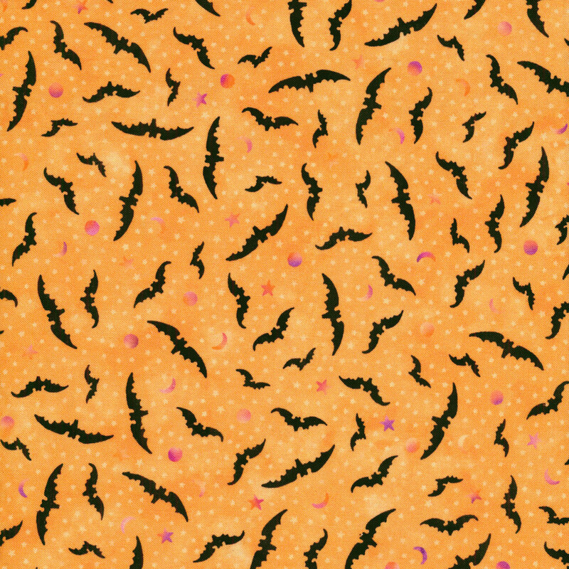 Orange fabric with black bats, purple moons, and light orange stars all over