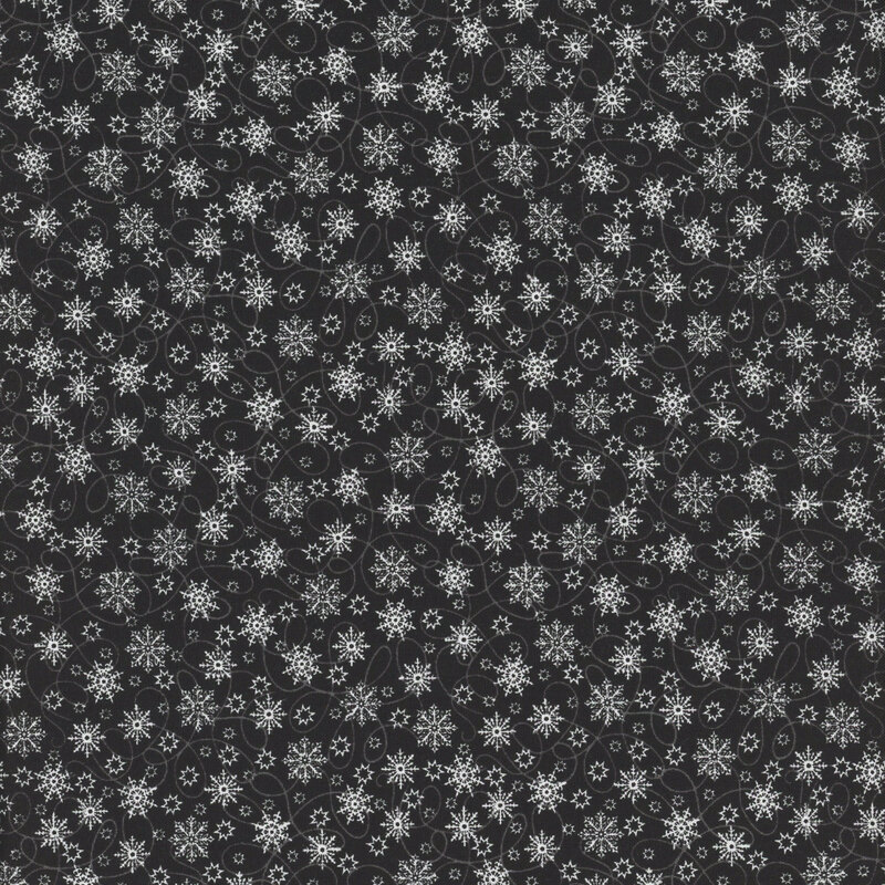 white snowflakes with gray swirls on a black background