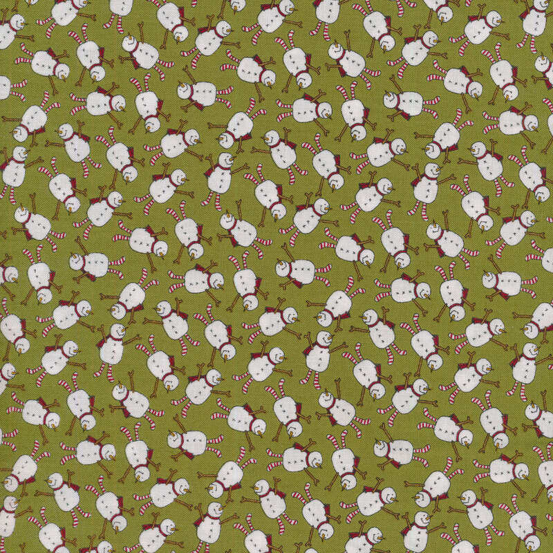 A forest green Christmas fabric covered in tossed joyful snowmen wearing little red scarves