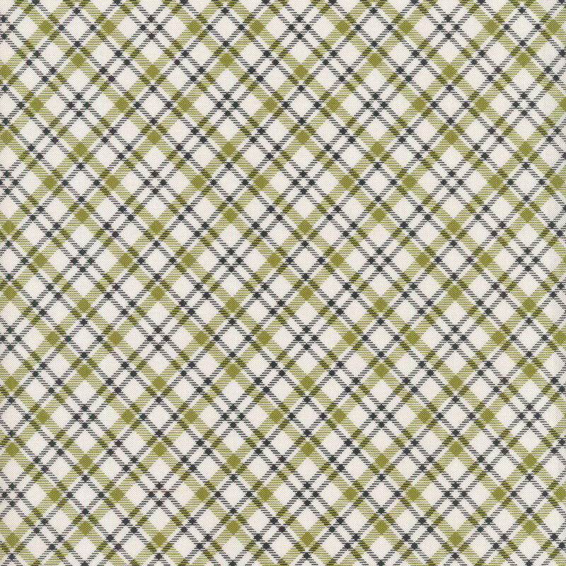 White, green, and black plaid fabric