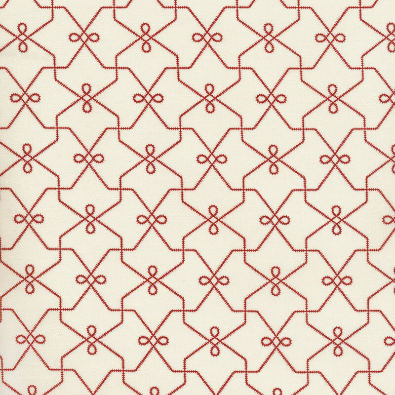 bright red repeating geometric pattern over a cream background