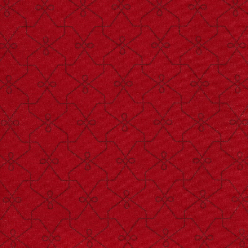 dark red repeating geometric pattern on a cherry red background