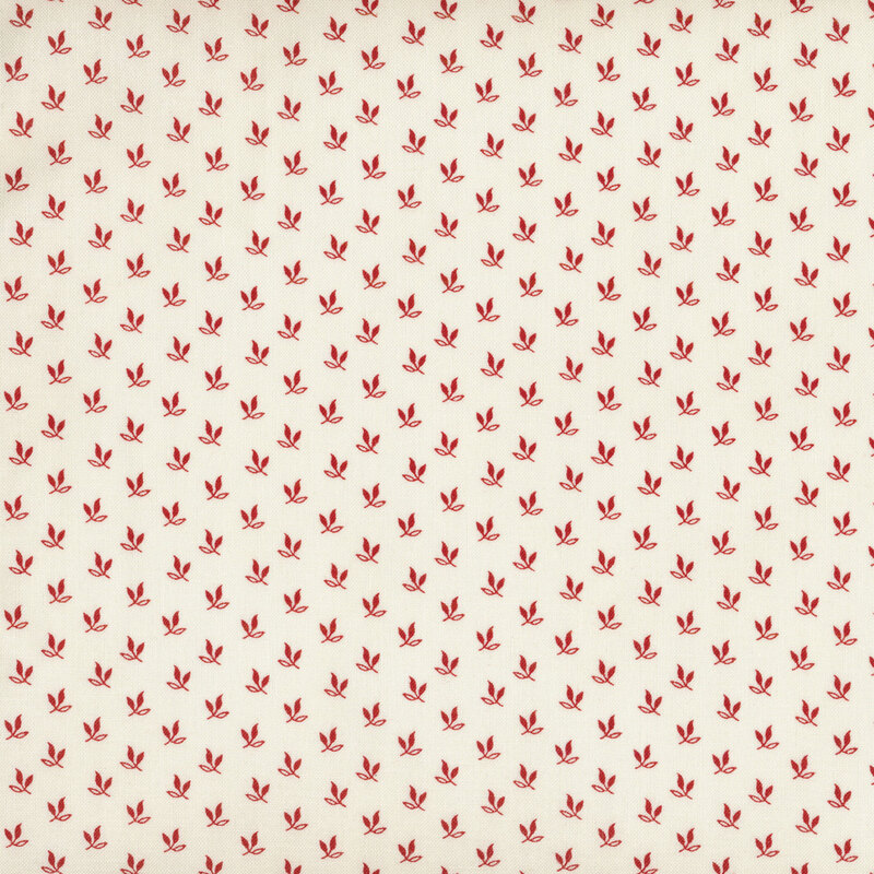 ditzy red leaf sprigs on a cream background