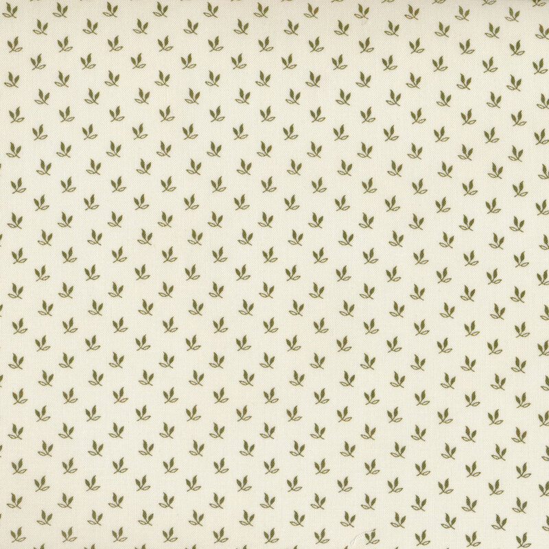 ditzy dark green leaf sprigs on a cream background