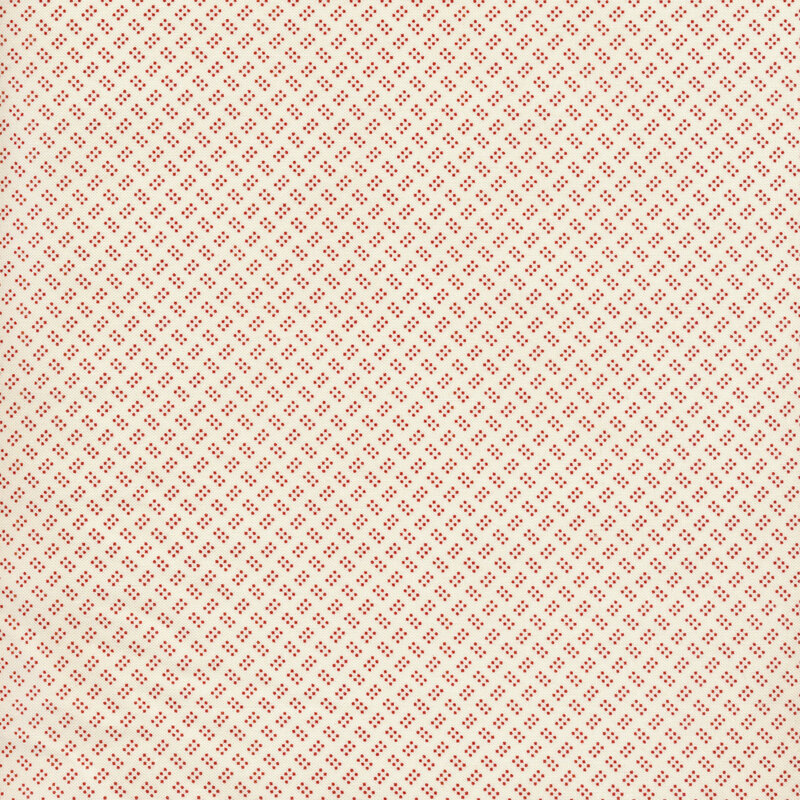 This cream fabric features clusters of six tiny red dots alternating in direction for an overall textured look