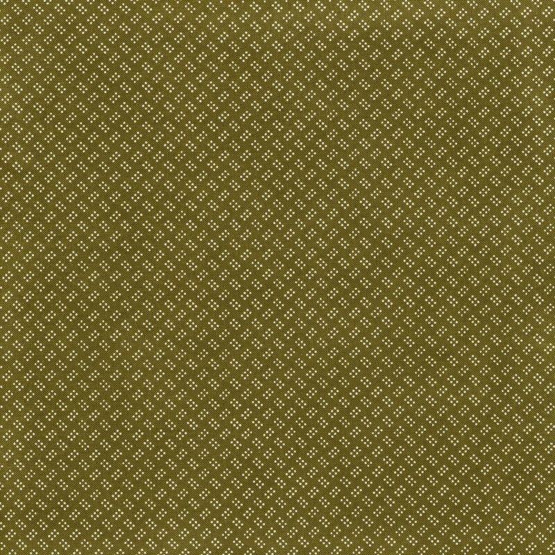 This green fabric features clusters of six tiny red dots alternating in direction for an overall textured look