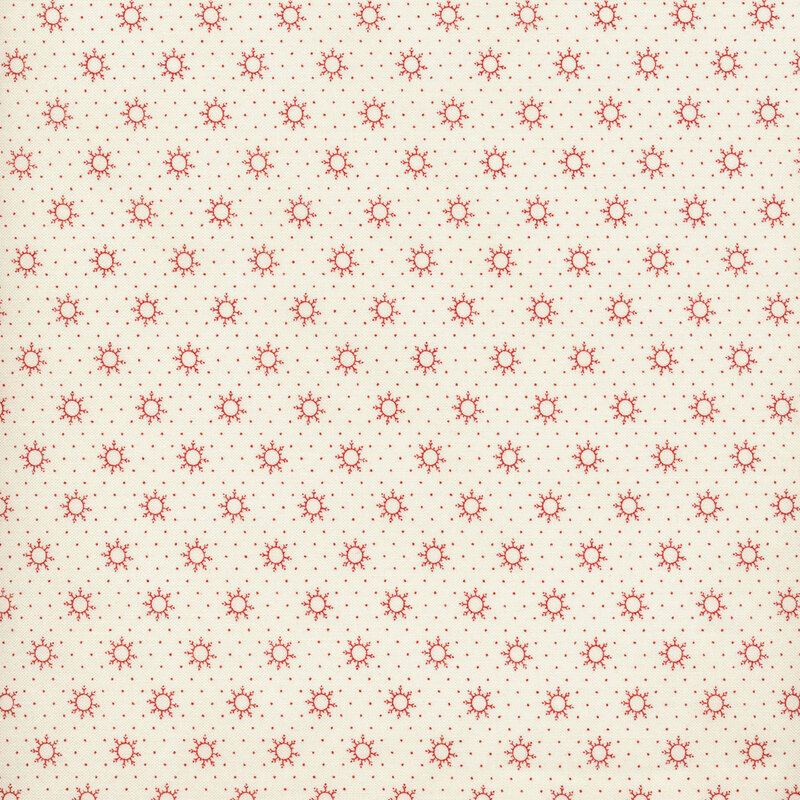 red dots and suns on a cream background 