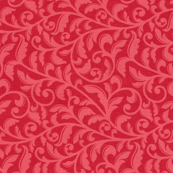 A textured fabric design in a vibrant red color featuring tonal, swirling floral and leaf patterns.