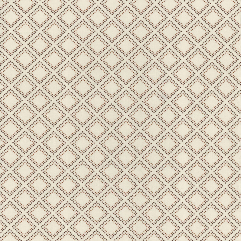 fabric with black and brown dots forming a lattice pattern on a cream background