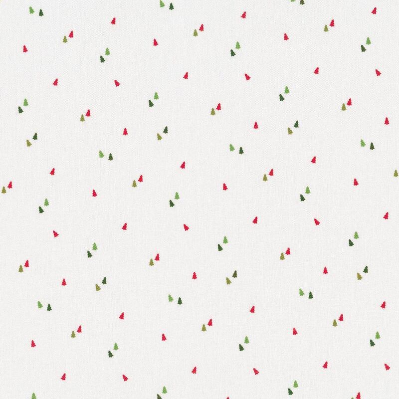 cream cotton fabric with tiny red and green evergreen trees scattered all over