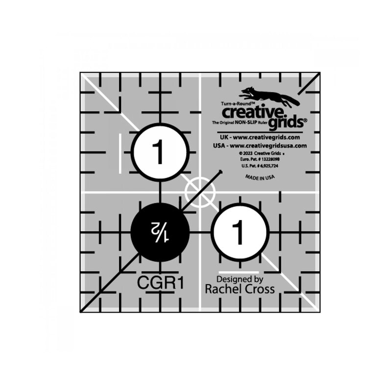 Black and gray quilting ruler with measurement markings, circles marked 1 and 1/2, designed by Rachel Cross.