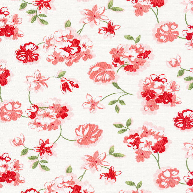 Cream colored fabric with tossed impressionist styled flowers in red and pink with green stems and leaves