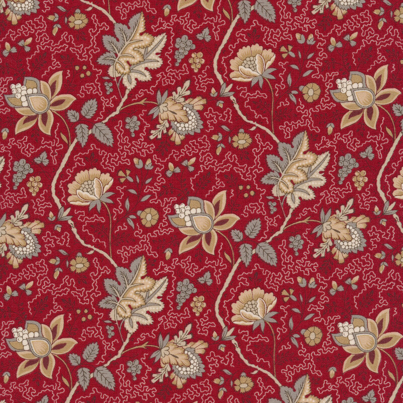 Floral fabric decorated with large tan flowers and gray leaves, accented with abstract lines on a red background