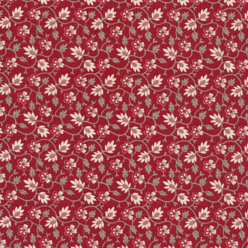 Floral fabric featuring small red flowers and cream leaf accents, connected by gray vines and set against a red background