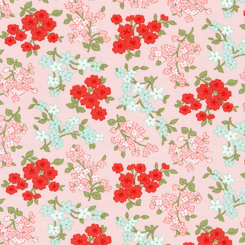 Light pink fabric with tossed flowers in aqua/mint, pink, and red with green stems and leaves