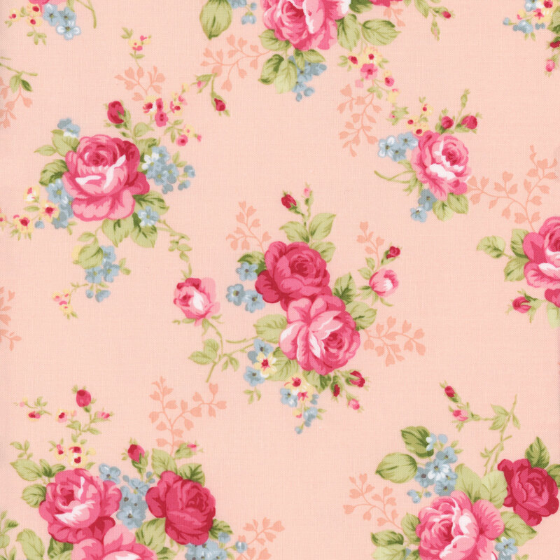 Floral fabric with a light green background featuring large pink roses and small blue and yellow flowers, accented by rosebuds and lush green leaves