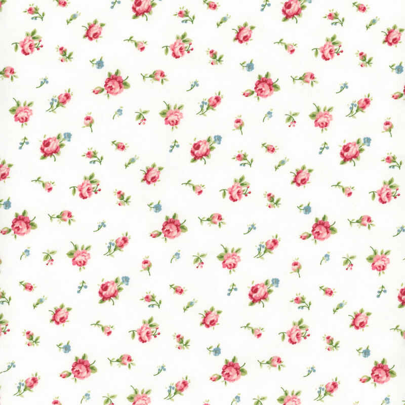 Floral fabric with a light cream background featuring pink roses in various stages of bloom, accented by small blue flowers