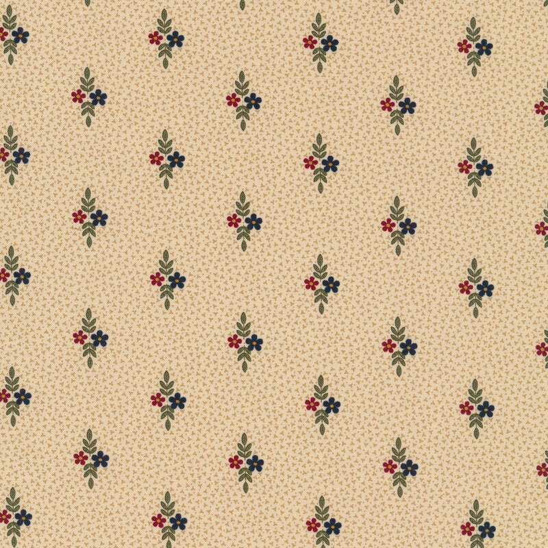 Fabric that features small motifs of red and blue flowers with sprigs of leaves on a cream background.