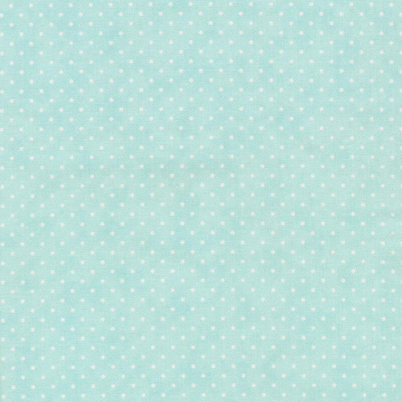 baby blue fabric with small white polka dots throughout