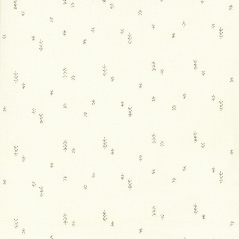 A light cream fabric with sparse illustrated little trees