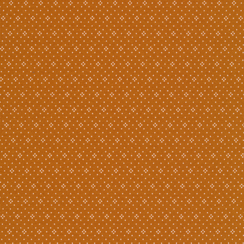 Tan fabric with small white dots all over