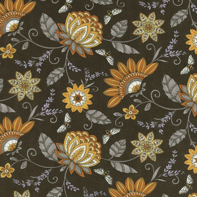 fabric with an array of ornate yellow florals and light gray vines on a dark gray background