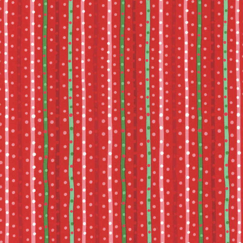 This fabric features red and green tonal stripes on a bright red background with matching dots.