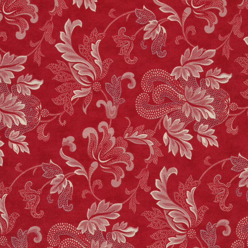 Scan of red fabric with large, floral tonal filigree patterns all over