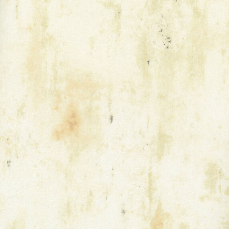 Cream fabric with a distressed, mottled texture