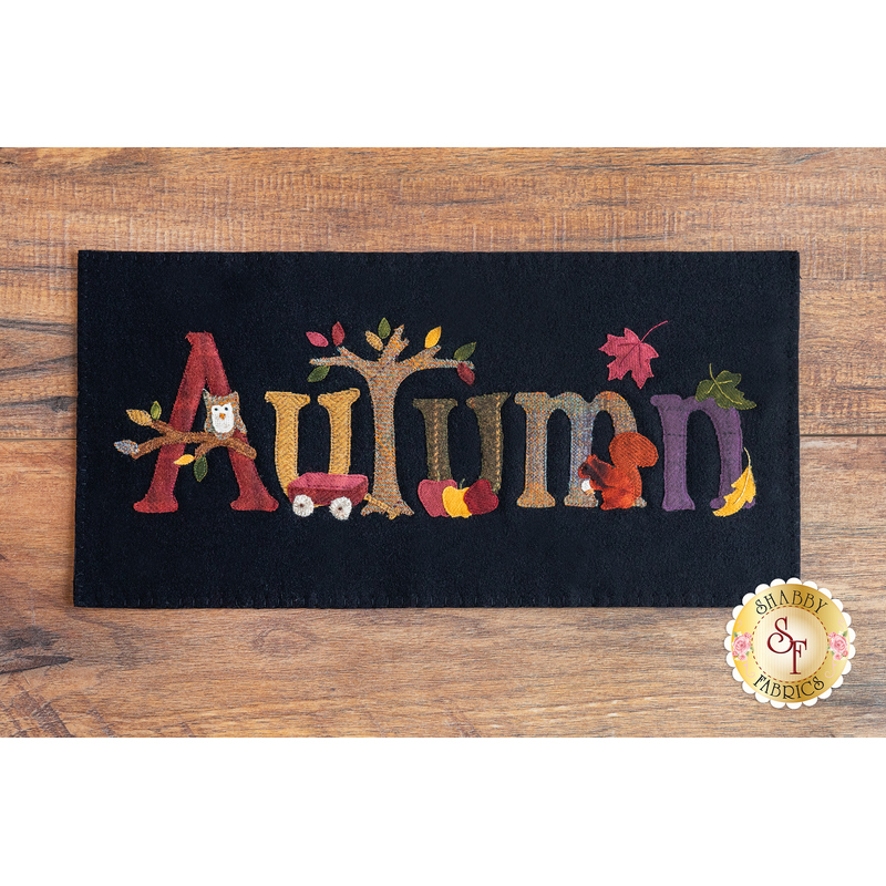 black rectangular table mat with the word 