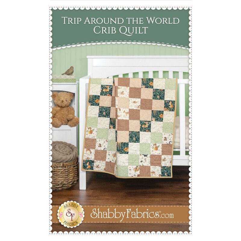 front cover of the trip around the world crib quilt pattern showing a finished project and pattern name.