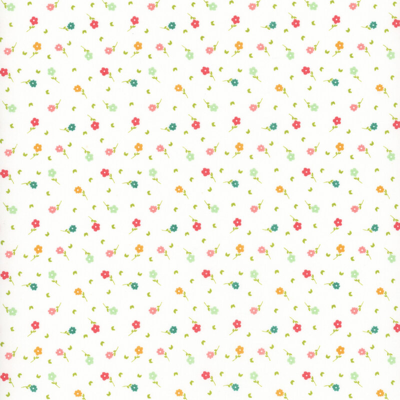 fabric featuring multicolored ditsy flowers on a solid white cream background.