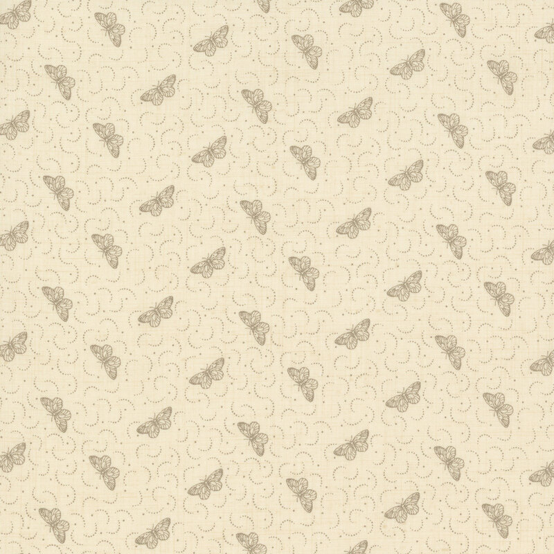 fabric featuring tossed faded warm gray butterflies with dots and dotted crescents on a textured woven cream background.