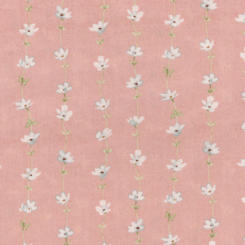 textured pink fabric featuring stripes of white flowers